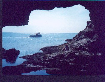 Anemone Cave, sunrise, Lobster boat and hiker