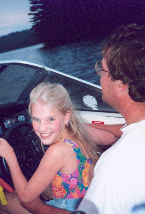 Shannon driving Alan's Boat