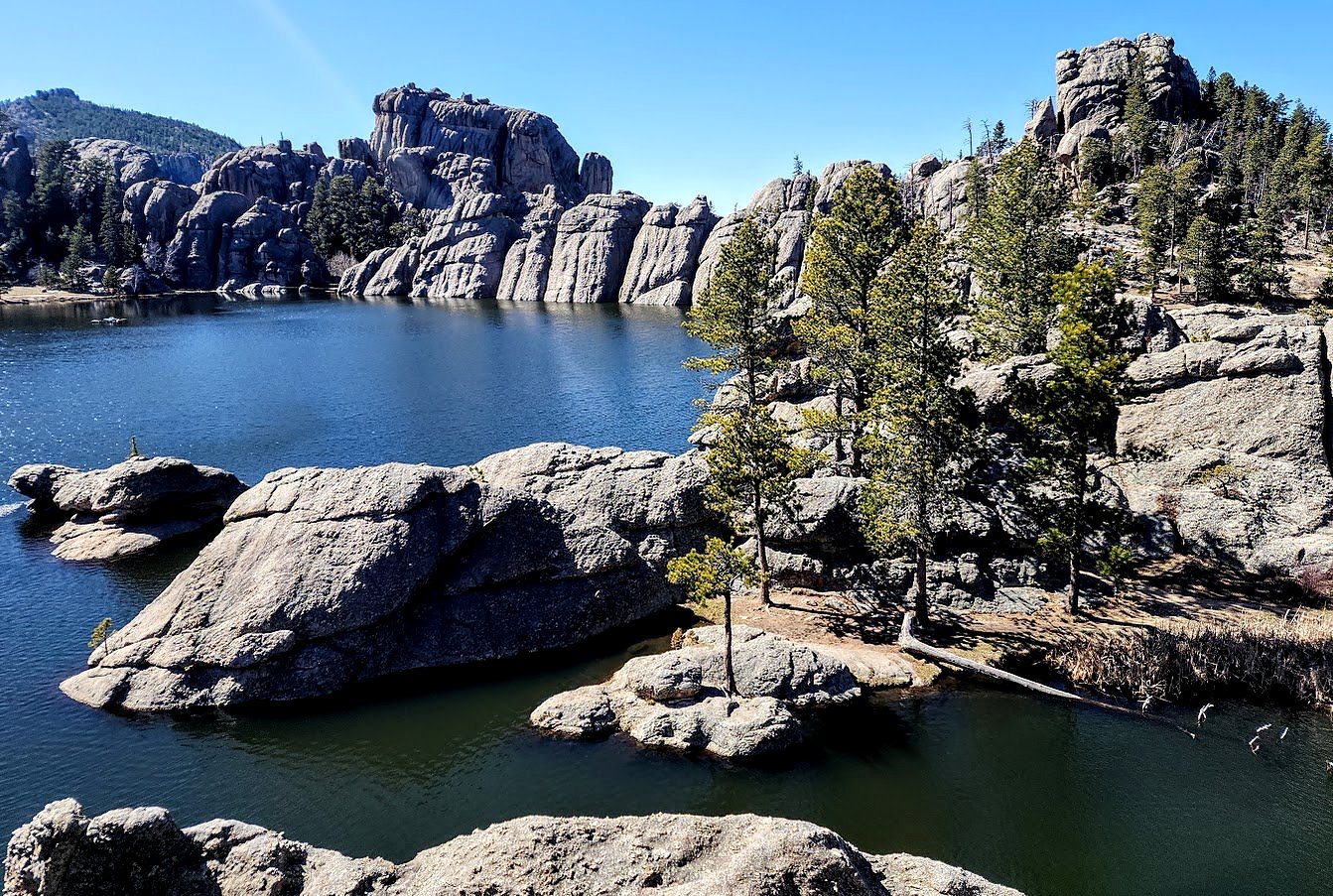 Sylvan Lake surrounded by granite towers in the Needles of South Dakota.