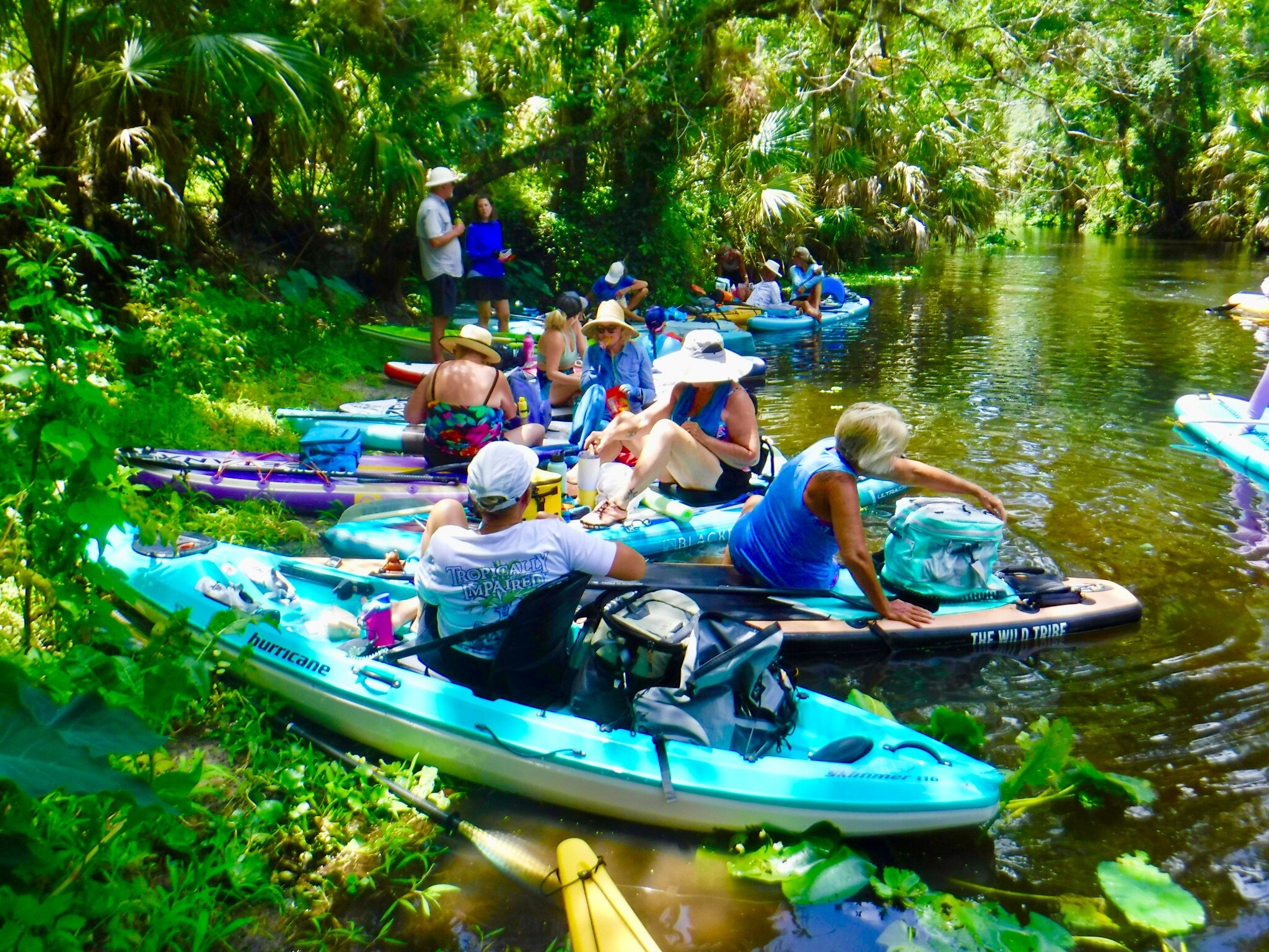 Group packed into a narrow shaded channel