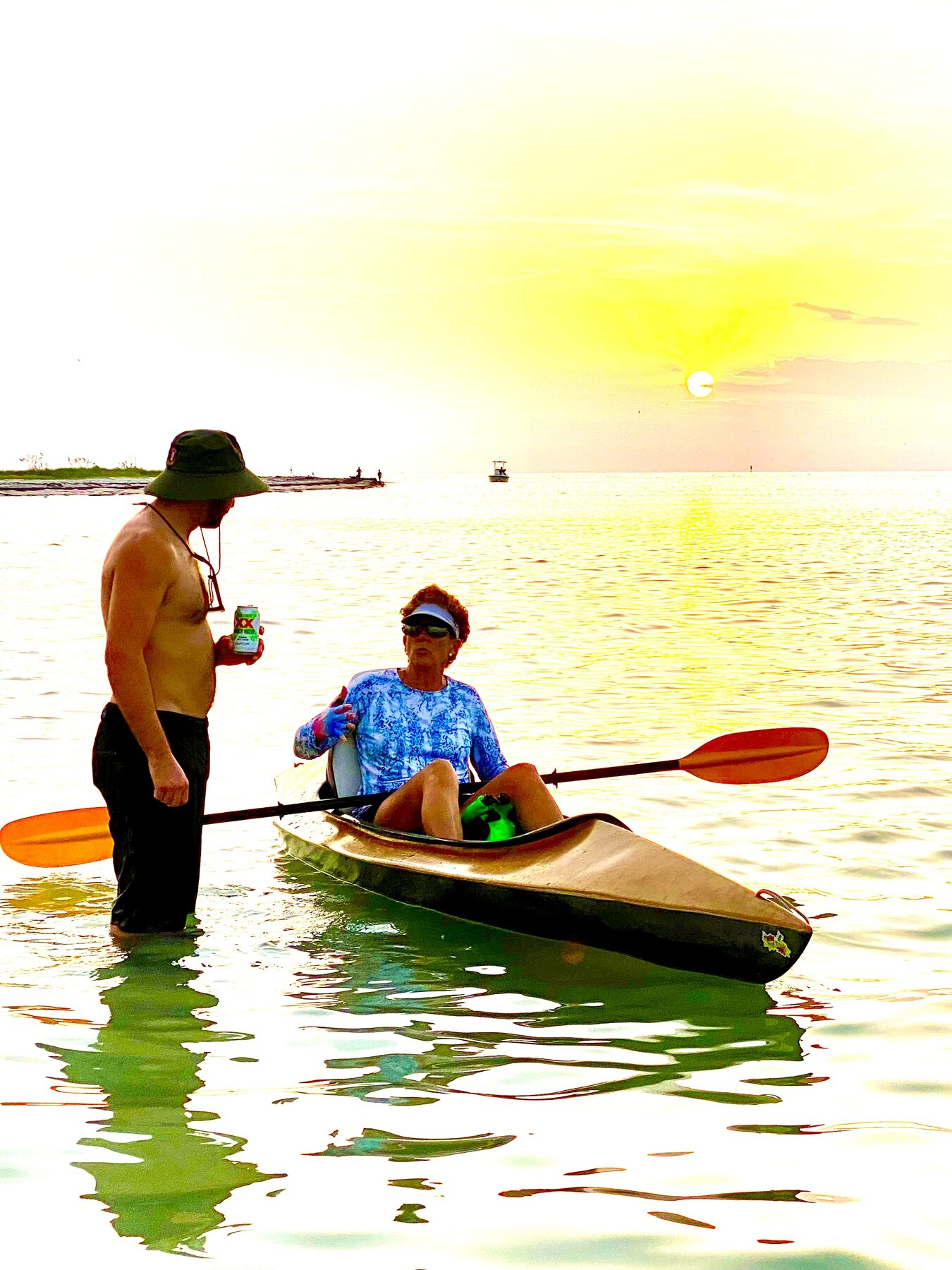 Helping kayaker launch