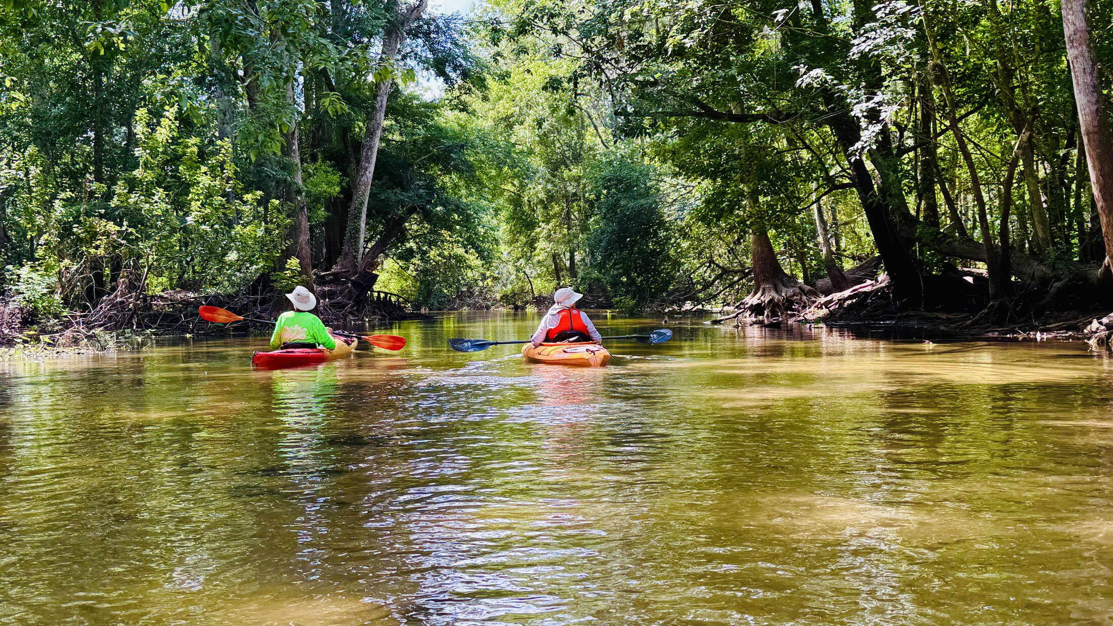 Kayakers on the broad river after Seventeen Runs