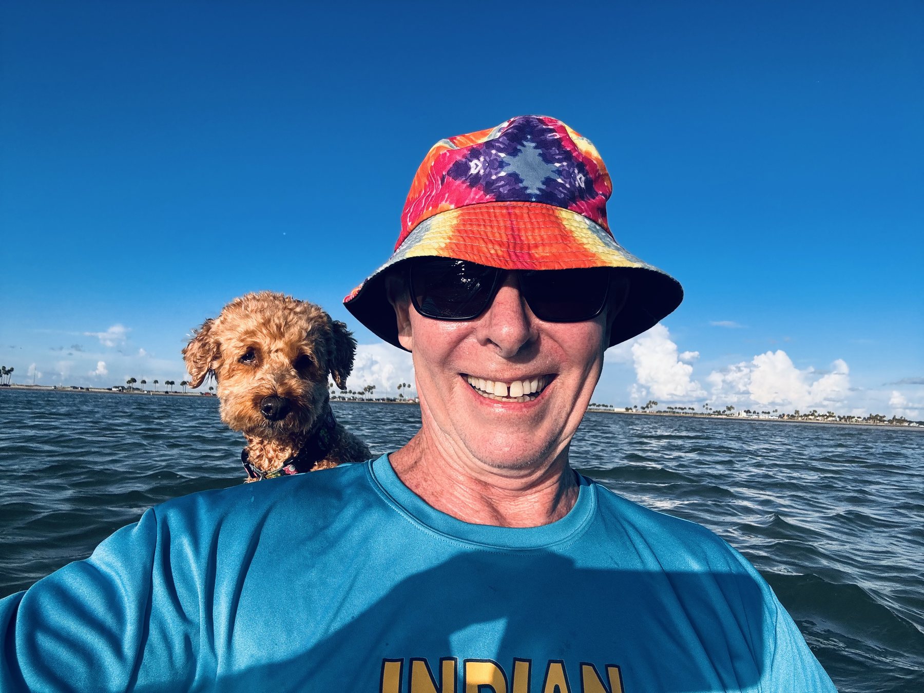 Photo #4: Tim and Buddyboy sharing the kayak on the way toward the island