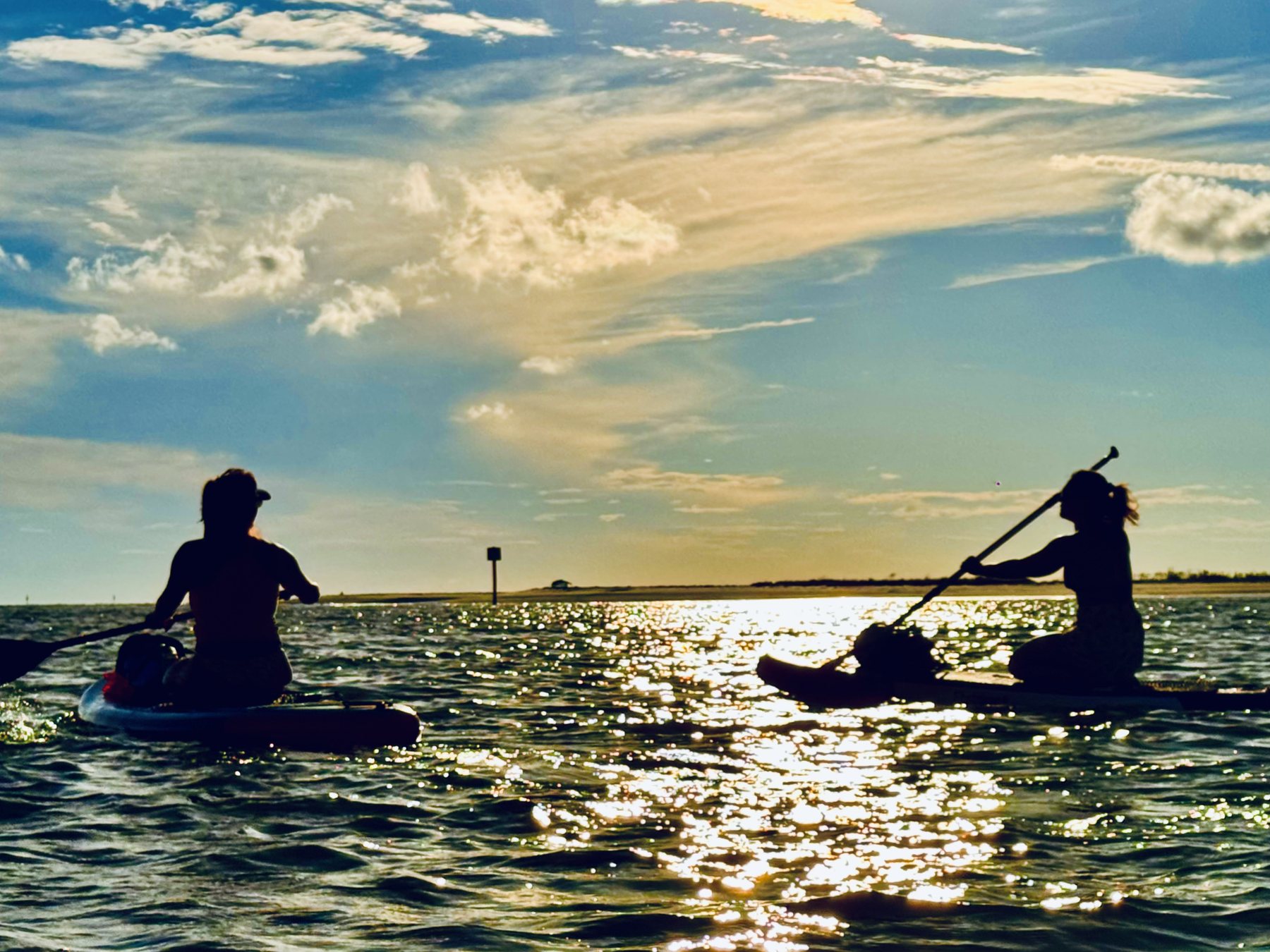 Photo #8: Two stand-up paddlers crossing the glowing water near Hurricane Pass