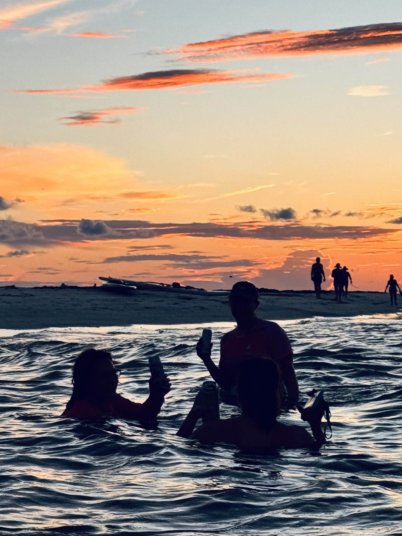 Photo #19: Paddlers enjoying the last red band of sunset before heading back