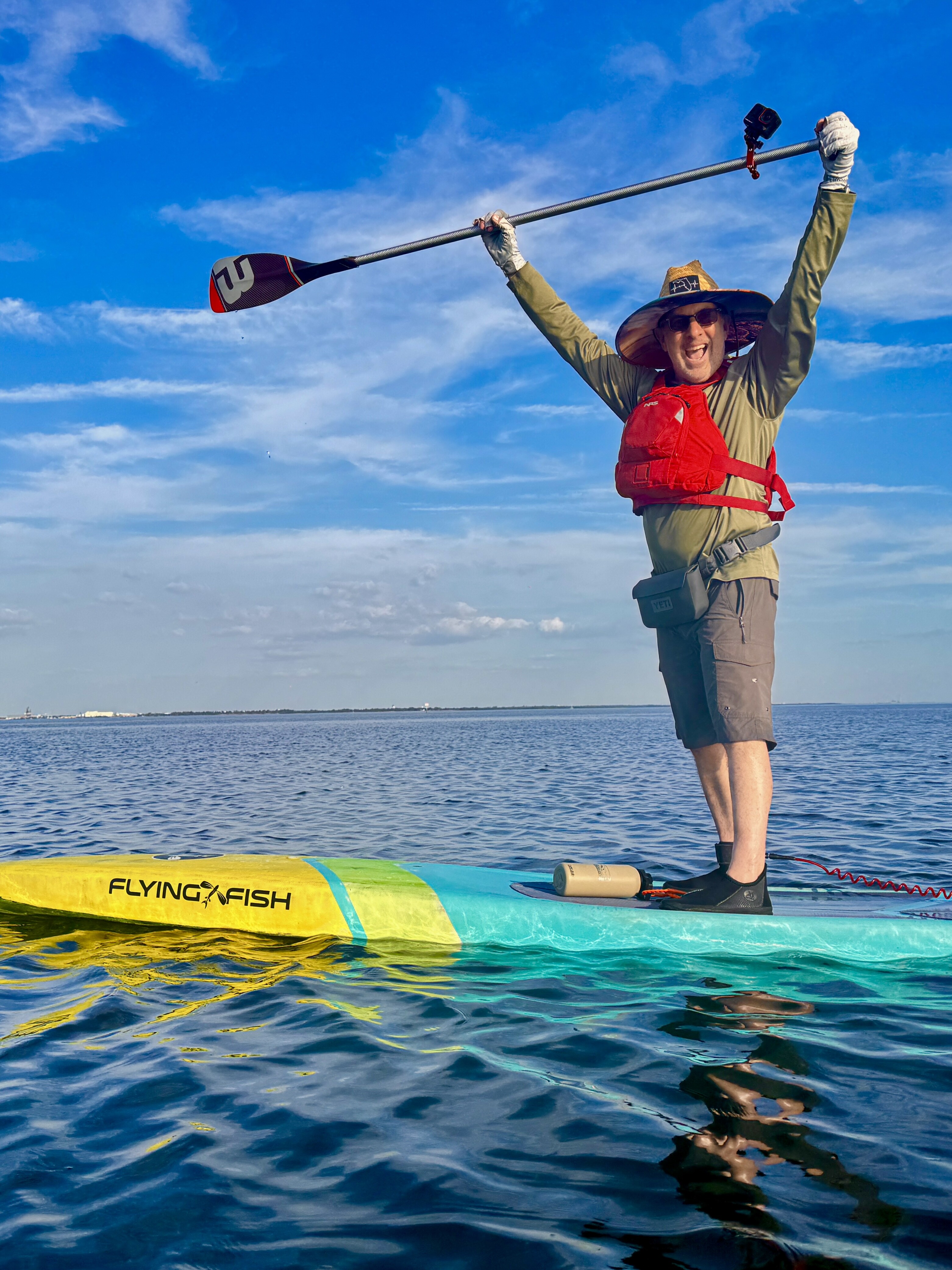 Robbie raising his paddle