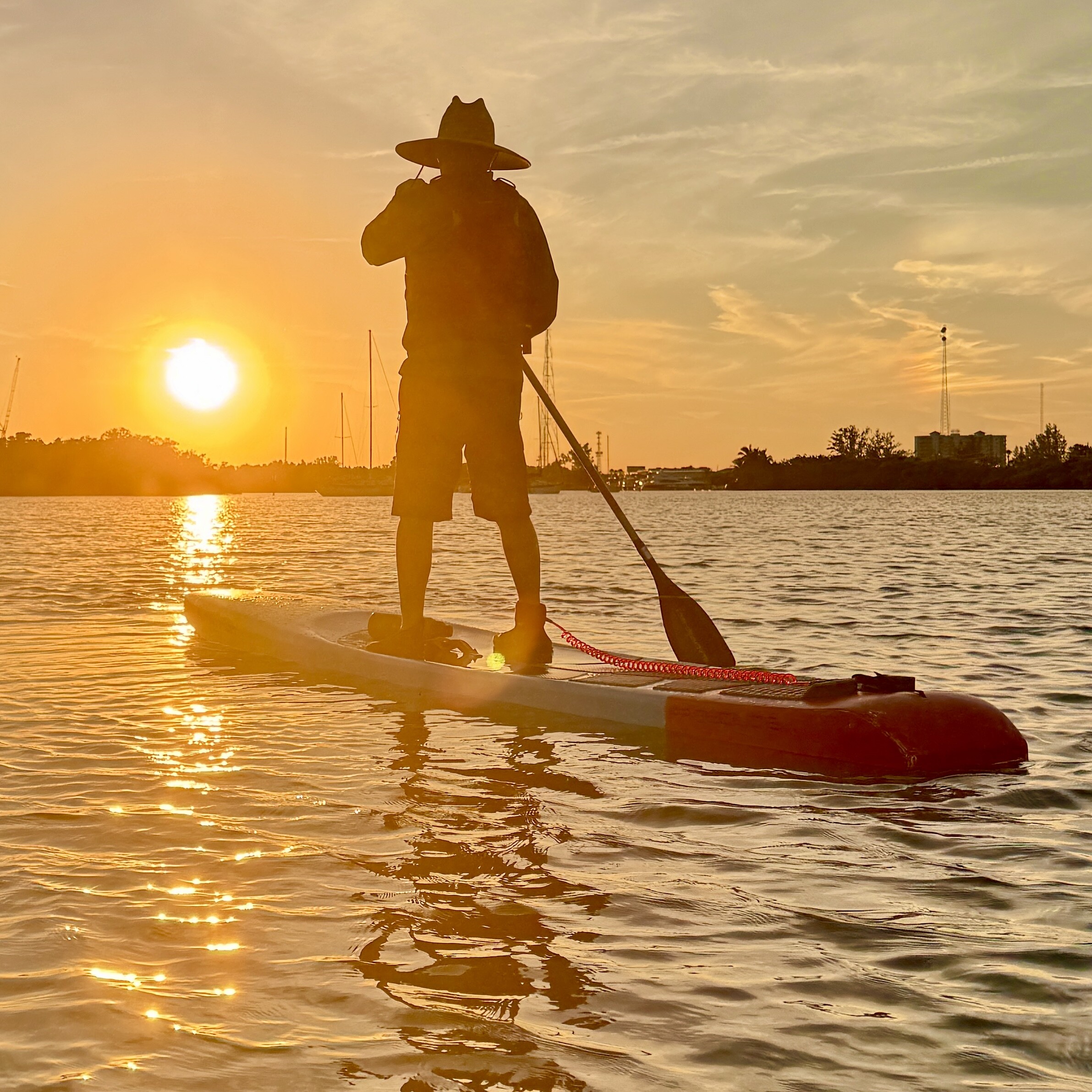 Robbie on golden sunset water