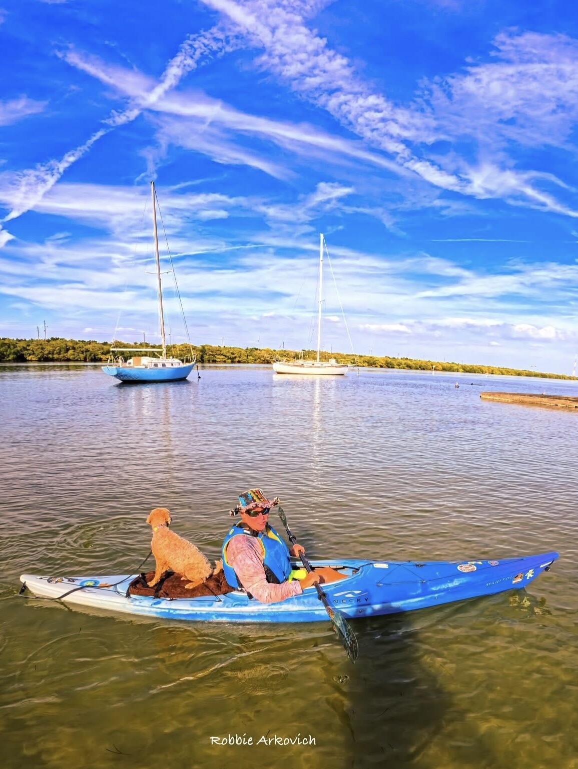 Robbie and Buddyboy on calm anchorage water