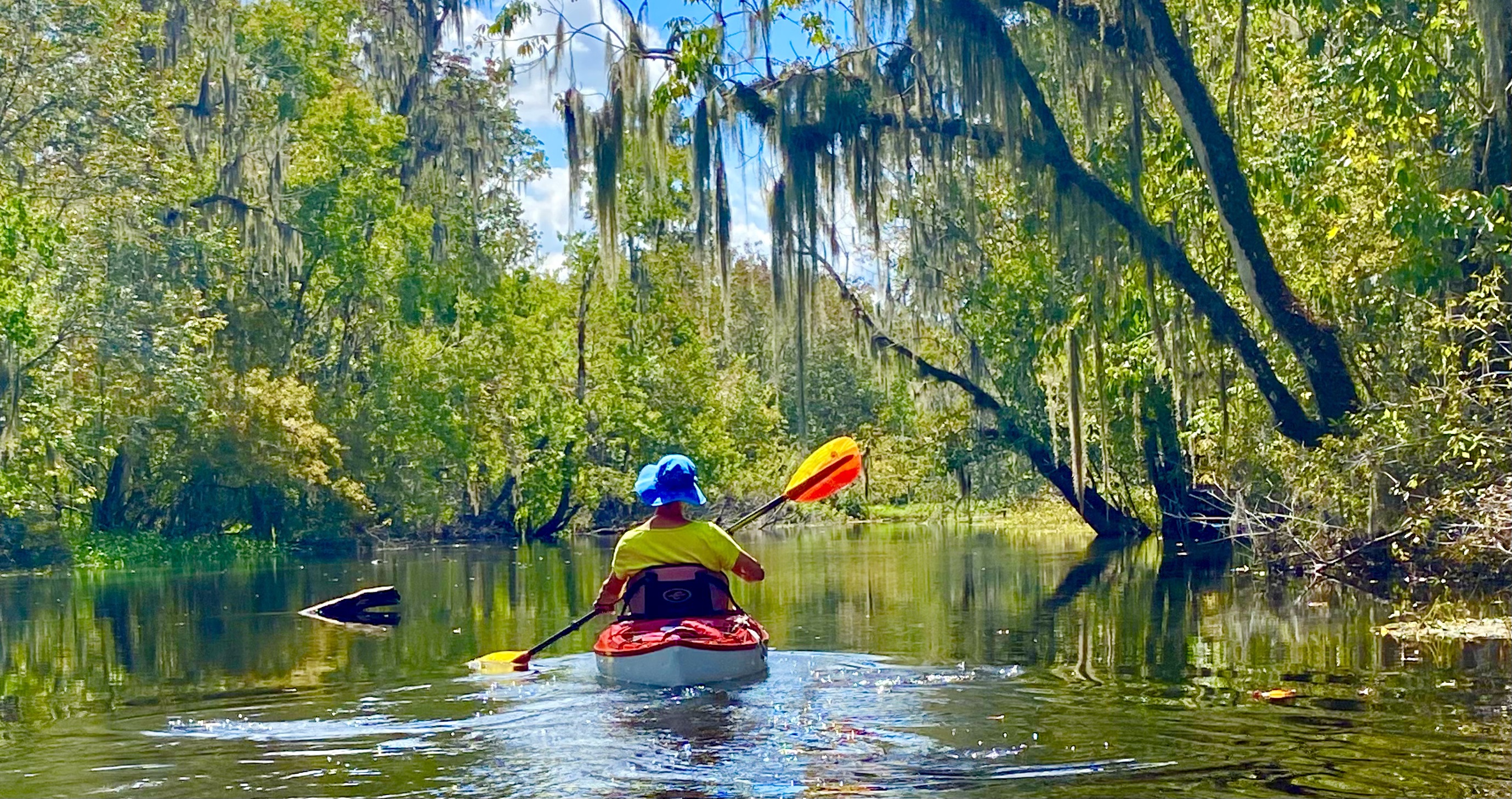 Claire kayaking back along the Hillsborough River