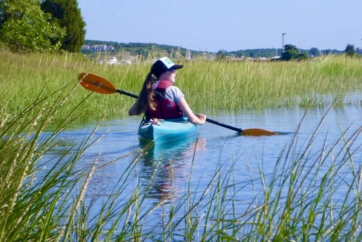 Paddling a narrow tidal channel