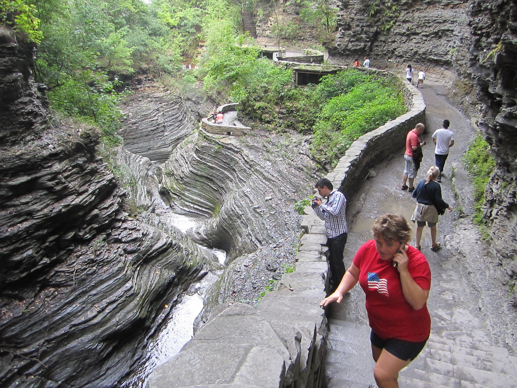 Walking beside the stream through the narrow gorge.