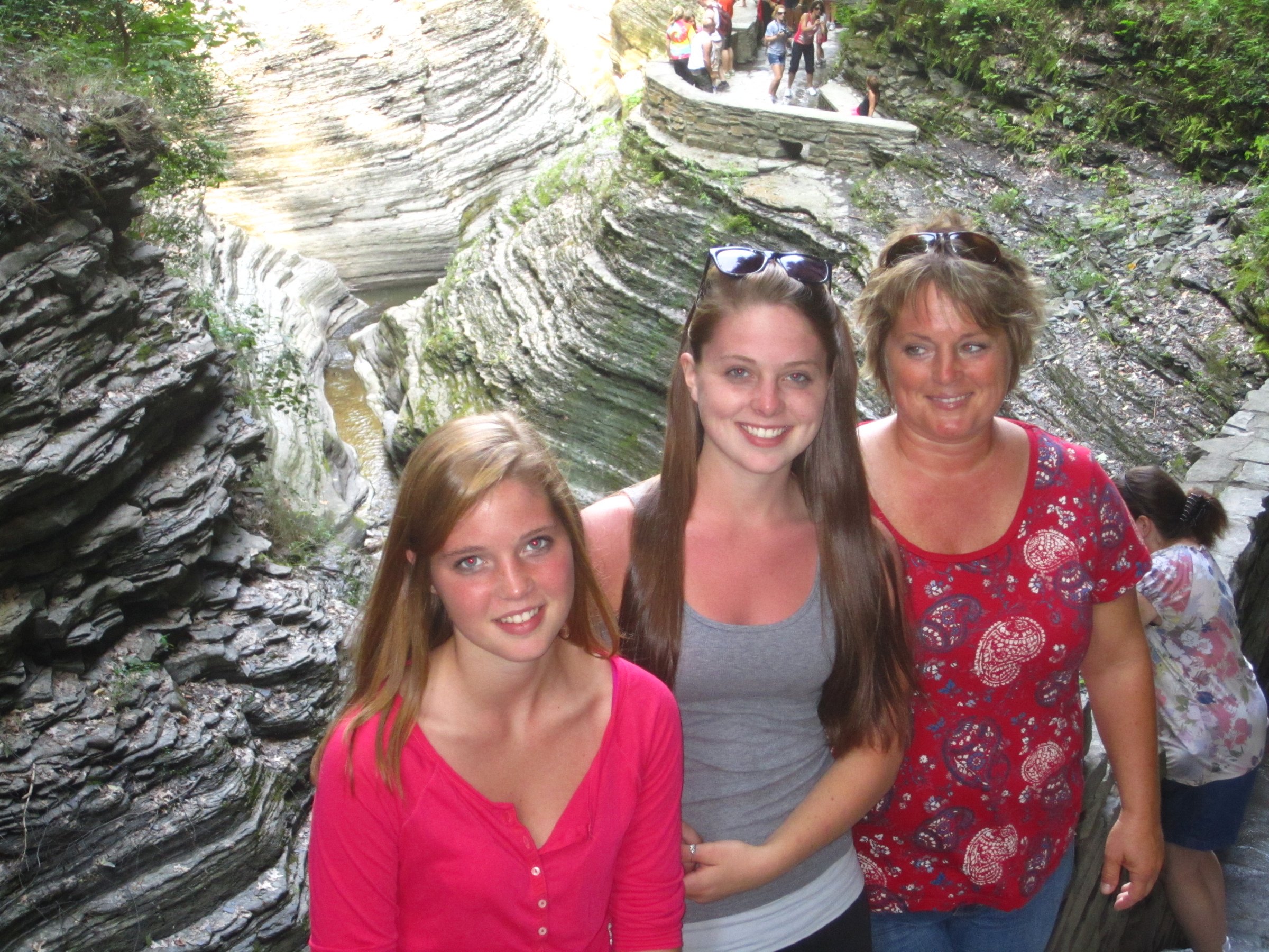 Cindy, Brinlin, and Delaney surrounded by the layered gorge walls.