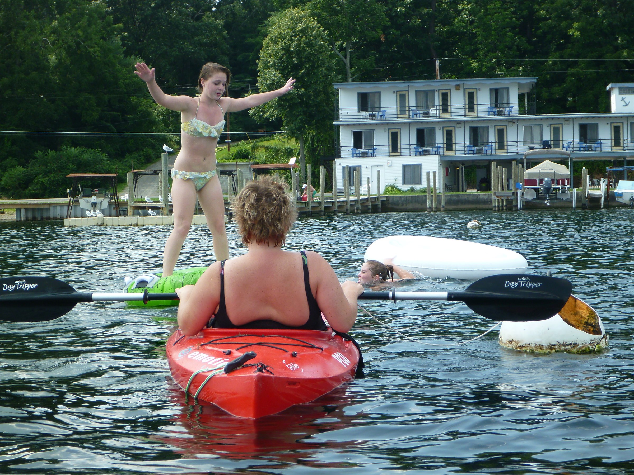 Balancing high on the raft during the lake games.