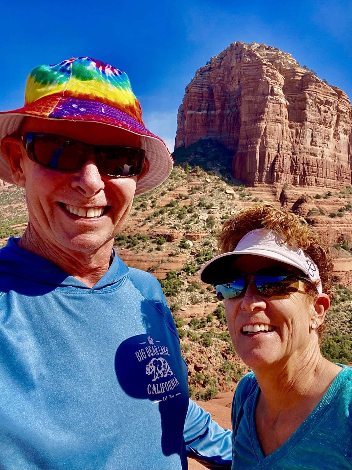 Tim and Kym hiking among the red-rock formations near Sedona.