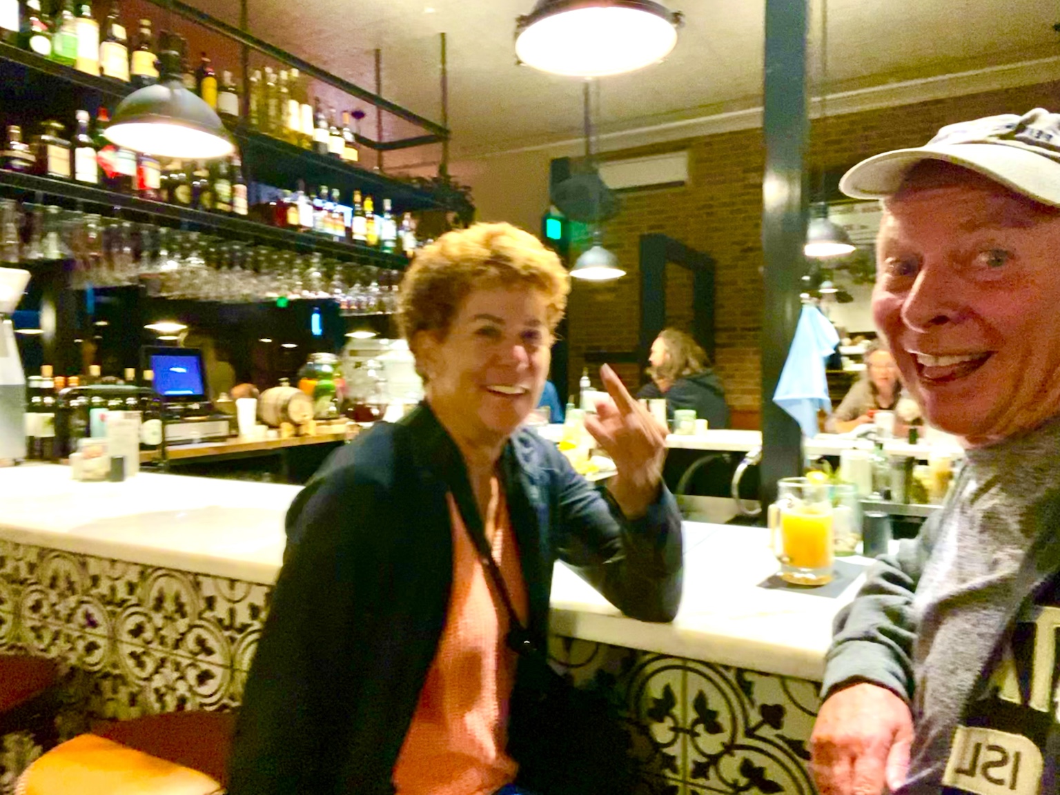A slightly blurry but cheerful snapshot at a city bar.