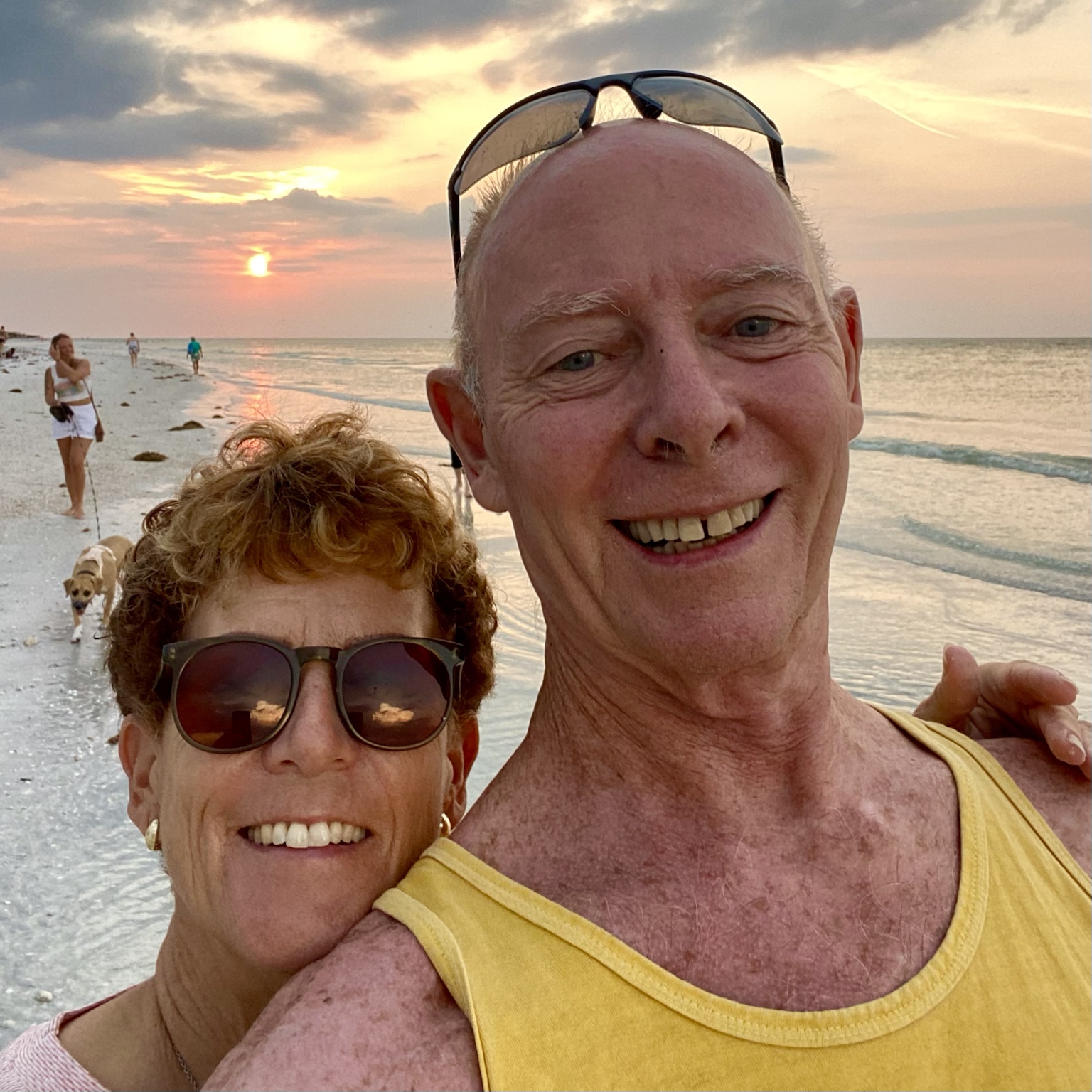 A close sunset selfie on the beach.