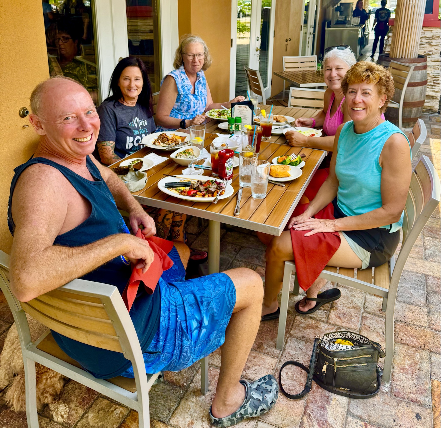 Lunch with friends around an outdoor table on a sunny Florida day.